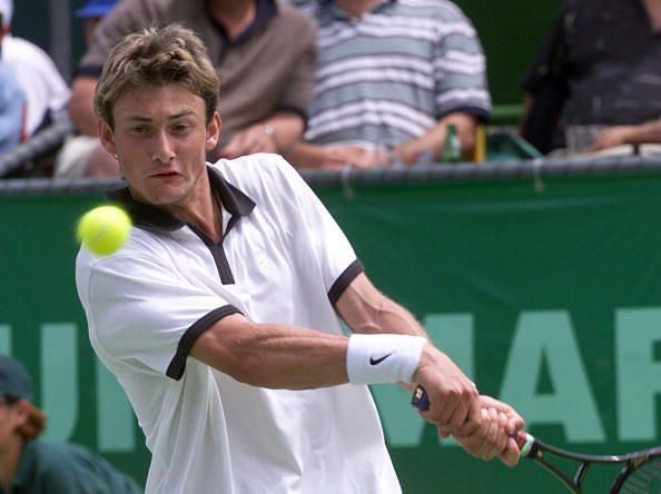 Juan Carlos Ferrero jagas Federerile ainsa kolmanda ringi väljapääsu USA lahtistel turniiril 2000. aastal