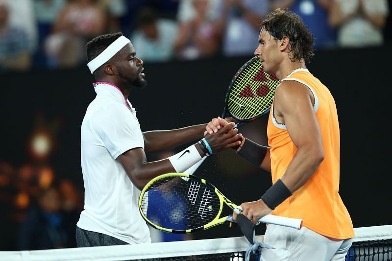Frances Tiafoe (izq.) Y Rafael Nadal