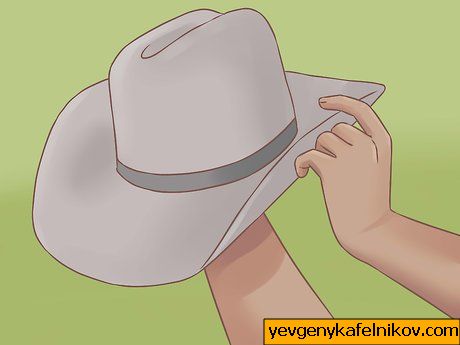 Bildet med tittelen Bruk en cowboyhatt riktig Trinn 4