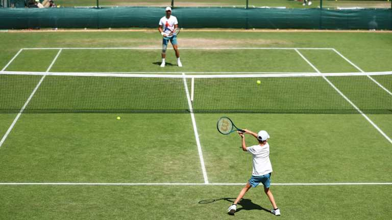 Džokovičius's oldest son Stefan joined the seven-time champion for a quick warmup and hit at Aorangi Park.