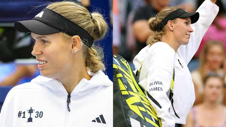 Wozniacki's warm-up hoodie highlights her career's biggest moments, and features the names of her children, Olivia and James.